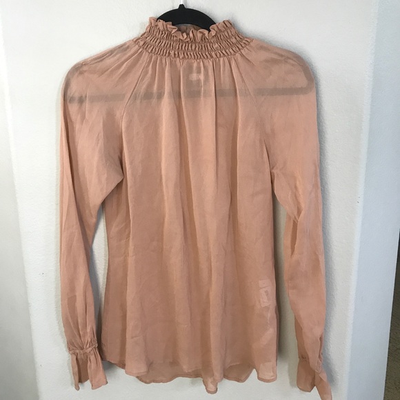 smocked turtleneck blouse